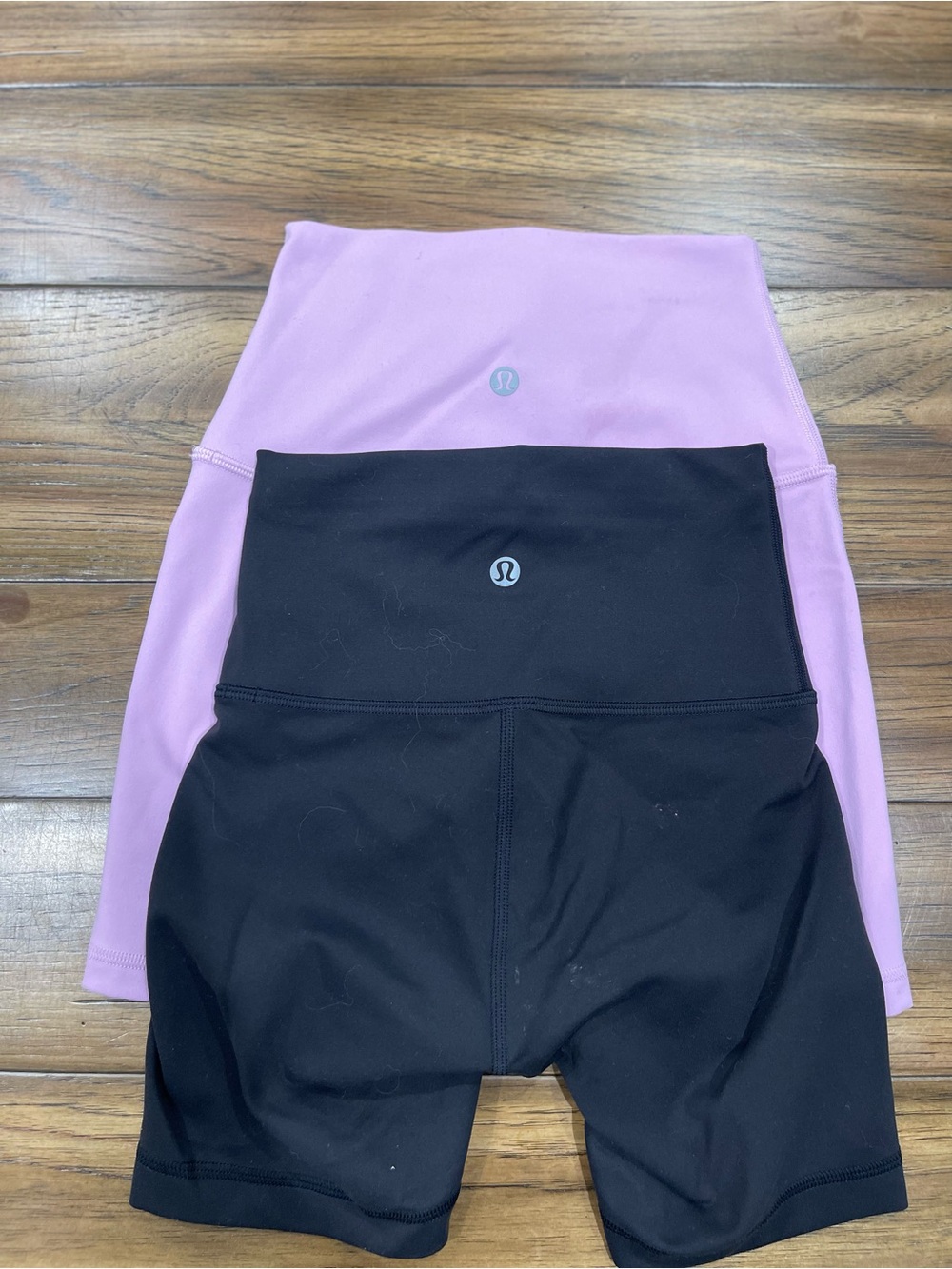 Lululemon Align shorts in black and pink.